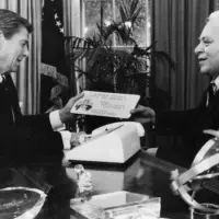 governor-coleman-in-the-oval-office-presenting-president-reagan-a-specialty-license-plate-from-american-samoa