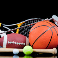assorted-sports-equipment-on-black