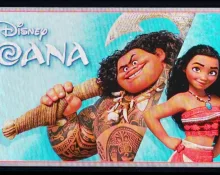 Movie theater marquee featuring the Disney film "Moana" along with the main characters