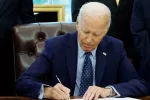 U.S. President Joe Biden signs a proclamation in the Oval Office of the White House. WASHINGTON^ DC - AUGUST 16