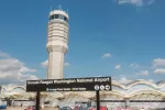 Control Tower^ National Airport seen from Metro Station platform. Ronald Reagan National Airport^ aka DCA^ is actually in Arlington^ three miles from DC. ARLINGTON^ VIRGINIA - OCT. 12^ 2017