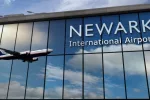 Aircraft landing at Newark^ New Jersey^ USA 3D rendering illustration. Arrival in the city with the glass airport terminal and reflection of jet plane. Travel^ business^ tourism and transport.