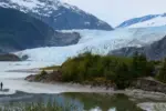 Tourist visiting Mendenhall Glacier. Juneau. Alaska.