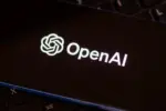OpenAI logo seen on the screen of smartphone. AI software developer. London^ United Kingdom^ December 21^ 2022.
