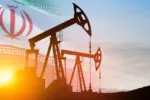 Oil drilling derricks at desert oilfield with Iran flag. The change in oil prices caused by the war. Oil prices are rising because of the global crisis. Crude oil production from the ground.
