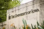 University of Iowa entrance sign at Hawkeyes' college campus Iowa City^ IA - May 23^ 2022