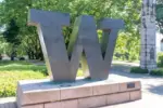 ‘W’ logo at University of Washington in Seattle^ WA^ USA - June 15^ 2023. The University of Washington is a public research university located in Seattle.