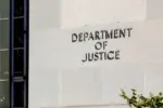Sign of United States Department of Justice(DOJ) on their headquarters building in Washington^ D.C. USA. Washington D.C.^ USA - March 1^ 2020