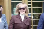 E. Jean Carroll smiles as she leaves the courtroom after a jury found former President Trump liable for sexual abuse and defamation. New York^ NY USA - May 9 2023