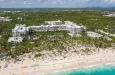 Aerial view from drone on RIU resort building on caribbean beach in Punta Cana^ Bavaro^ Dominican Republic - 8 April 2022