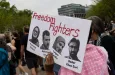 Demonstrators gather during a protest in front of the White House in Washington^ DC^ on April 19^ 2025.