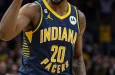 professional male nba basketball indiana pacers player^ screaming^ pointing finger up