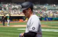 New York Yankees' Anthony Rizzo #48 walks back to the dugout after grounding out during a game against the Oakland Athletics at RingCentral Coliseum. Oakland^ California - August 28^ 2021