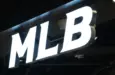 MLB (Major League Baseball) brand logo store sign close up
