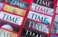 Colorful close-up of overlapping TIME Magazine covers^ highlighting diverse headlines on world leaders^ politics^ business^ and social issues. Calgary^ Alberta^ Canada. Dec 1^ 2025