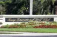 An Entrance to Trump International Golf Club in West Palm Beach^ Florida on April 25^ 2018. Trump International Golf Club is owned by President Donald J. Trump. WEST PALM BEACH^ FL^ USA - APRIL 25