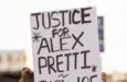 People protest the ICE killing of Alex Pretti in front of the downtown Federal Building. Los Angeles^ California^ USA - January 25^ 2026