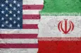 United States of America vs Iran - Cracked concrete wall painted with a USA flag on the left and a Iranian flag on the right