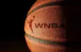 Closeup of a basketball with the WNBA logo and text Raleigh^ NC - USA - 06-13-2024