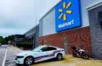 Police car parked in front of Walmart Store^ Fayetteville^ North Carolina^ USA^ August 6^ 2025