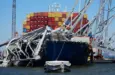 Container vessel Dali is trapped and aground under the wreckage of the Francis Scott Key Bridge in Baltimore. Baltimore^ MD USA - 4-23-2024