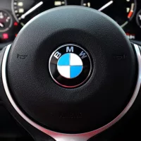 BMW X4 M Performance steering wheel. BMW X4 interior. BMW X4 dashboard. New car SUV steering wheel. Buttons on the steering wheel^ hands-free system.