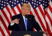 President Donald Trump speaks on election night in the East Room of the White House in the early morning hours of November 04^ 2020 in Washington^ DC.