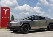 Tesla Cybertruck display at a dealership. Tesla claims the Cybertruck has a driving range of up to 340 miles. Indianapolis - May 19^ 2024: