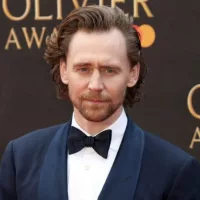 Tom Hiddleston attends The Olivier Awards at the Royal Albert Hall in London^ England. London^ United Kingdom - April 7^ 2019