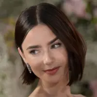 Lily Collins at the premiere for season 4 of Emily in Paris at the Egyptian Theatre. LOS ANGELES^ USA. August 14^ 2024