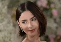 Lily Collins at the premiere for season 4 of Emily in Paris at the Egyptian Theatre. LOS ANGELES^ USA. August 14^ 2024