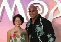 Auli'i Cravalho and Dwayne Johnson attend the "Moana 2" UK Premiere at Cineworld Leicester Square in London^ England.