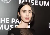 Lily Collins wearing dress and shoes by Versace attends PaleyLive program: Emily in Paris: The Magic Behind the Scenes at Paley Center for MEdia in New York on September 17^ 2024