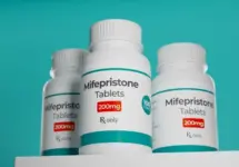 Mifepristone tablets in bottle. RU-486 Medical abortion pills. Used in combination with misoprostol. 3D illustration.