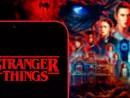 Computer keyboard with the Iphone 11 pro with the Stranger Things logo.