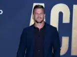 Alan Ritchson at the 2022 Academy of Country Music Awards Arrivals at Allegient Stadium on March 7^ 2022 in Las Vegas^ NV