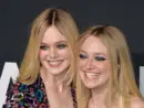 Elle Fanning & Dakota Fanning arriving at the Saint Laurent at the Palladium fashion show at the Hollywood Palladium. LOS ANGELES^ CA - FEBRUARY 10^ 2016
