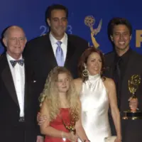 'Everybody Loves Raymond' stars PETER BOYLE (left)^ BRAD GARRETT^ MADYLIN SWEETEN^ PATRICIA HEATON & RAY ROMANO at the 55th Annual Emmy Awards in Los Angeles. Sept 21^ 2003
