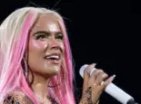 Singer Karol G during a performance at the Santiago Bernabeu^ on July 20^ 2024^ in Madrid^ Spain