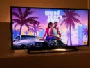 PlayStation 5. New Grand Theft Auto VI Sony PS5 console. Dualsense controller. Man holding joystick and ready to play upcoming GTA 6 game