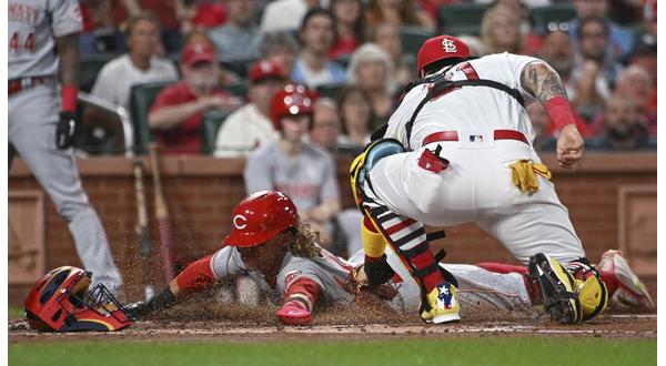 Cardinals catcher Yadier Molina is hit by a pitch in a rehab