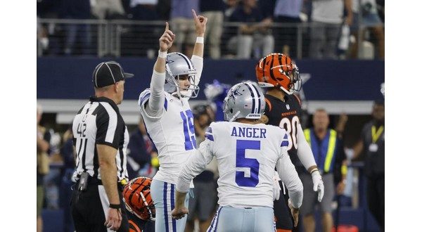 Dallas Cowboys punter Bryan Anger kicks a punt in the second half of an NFL  football game against the Washington Commanders, Sunday, Jan. 8, 2023, in  Landover, Md. (AP Photo/Patrick Semansky Stock