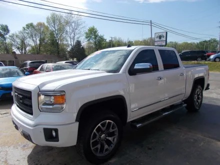 https://dehayf5mhw1h7.cloudfront.net/wp-content/uploads/sites/683/2023/06/28092625/2014-gmc-sierra-1500-slt-4x4-4dr-crew-cab-5-8-ft-sb-440x330.webp