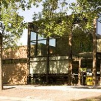 Huron Public Library shaded by trees