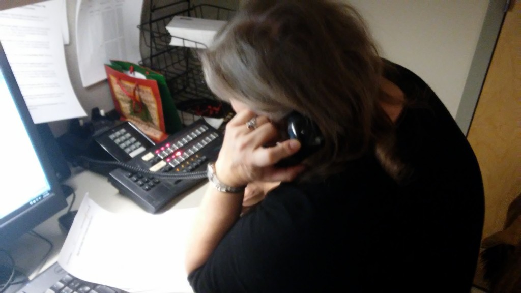 Kathryn works the phones