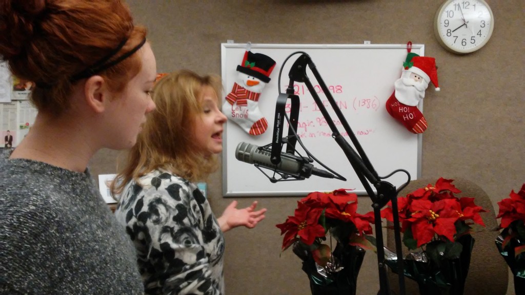 Raina and Ginger talking on the radio