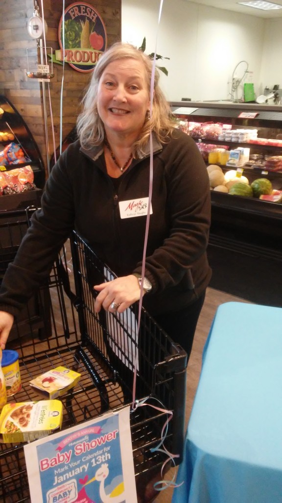 Kathryn helps fill the baby shower cart in Columbus