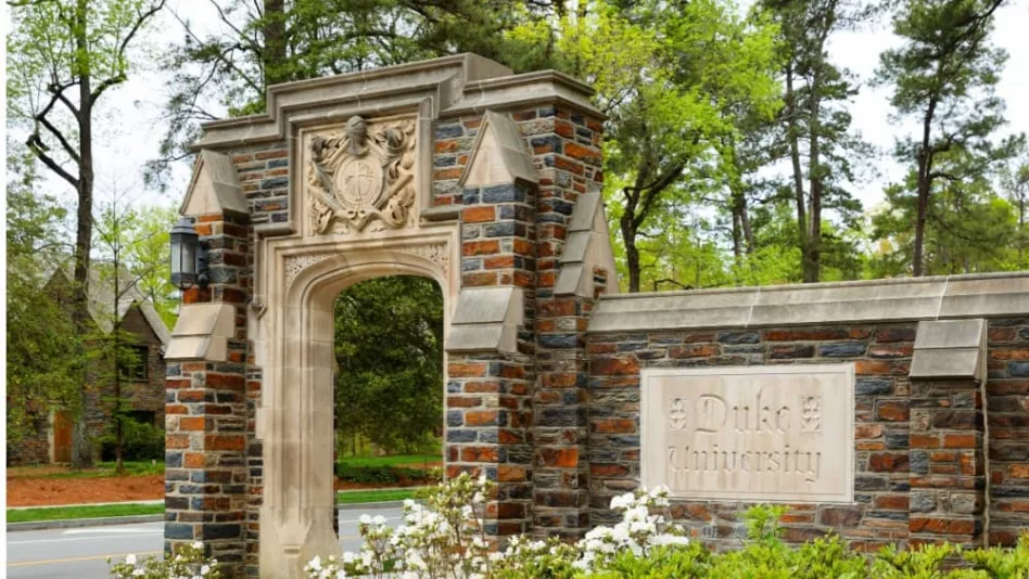 Entrance Sign of Duke University on campus of Duke University in Durham^ North Carolina^ Duke is a private top ranked research university in NC. Durham^ NC^ USA - April 16^ 2022