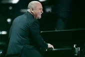 Billy Joel performs in concert at Allegiant Stadium on February 26^ 2022 in Las Vegas^ Nevada.