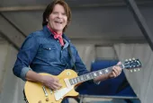 Creedence Clearwater Revival lead singer John Fogerty performs at the 2014 New Orleans Jazz and Heritage Festival. New Orleans^ LA - May 4^ 2014